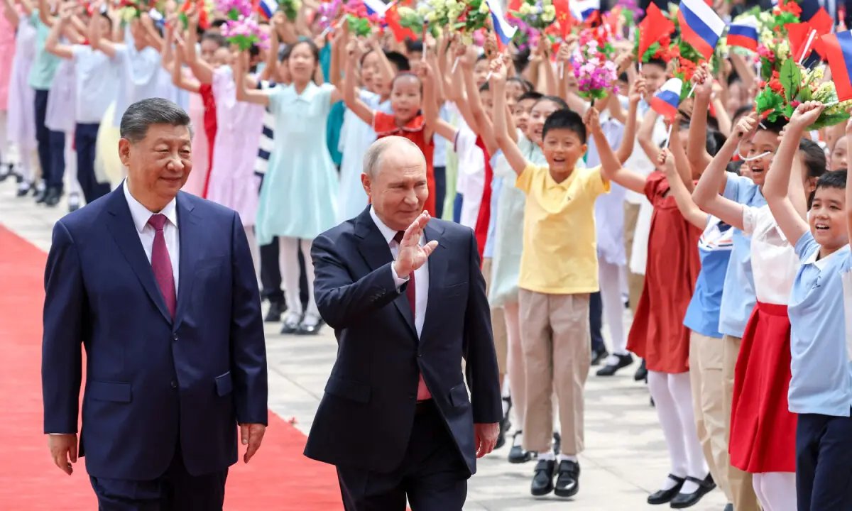 Putin, Xi hail 'unyielding' ties in China talks after Trump visit