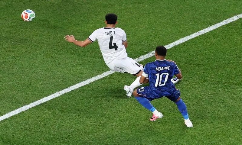 Mbappe scores twice as France beat Iraq at World Cup after two-hour storm delay