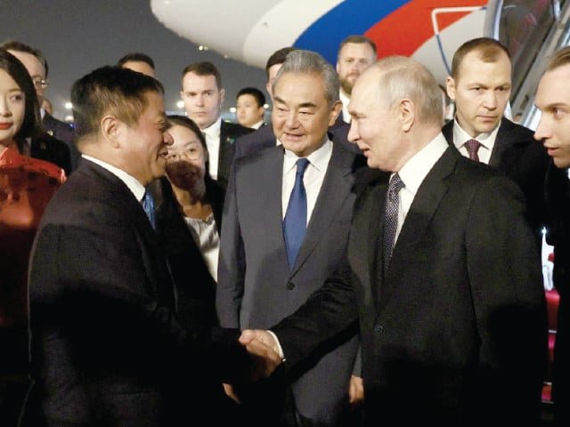Putin arrives in China for talks with 'long-time friend' Xi