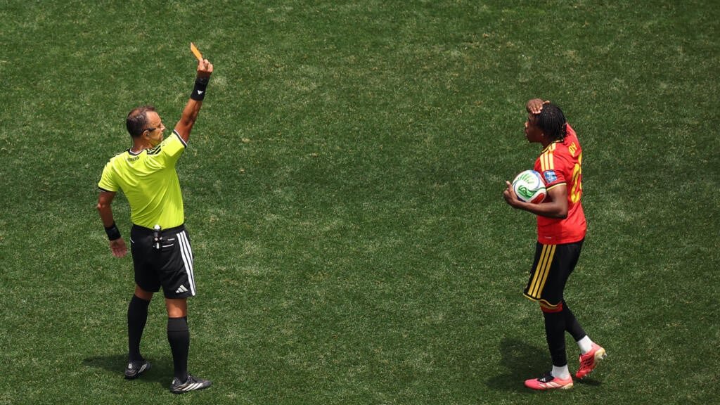Belgium held by Iran as Ngoy sent off