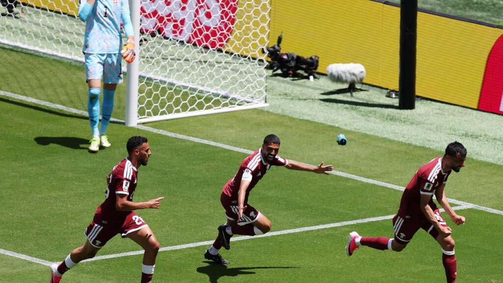 Qatar earn dramatic draw against Switzerland