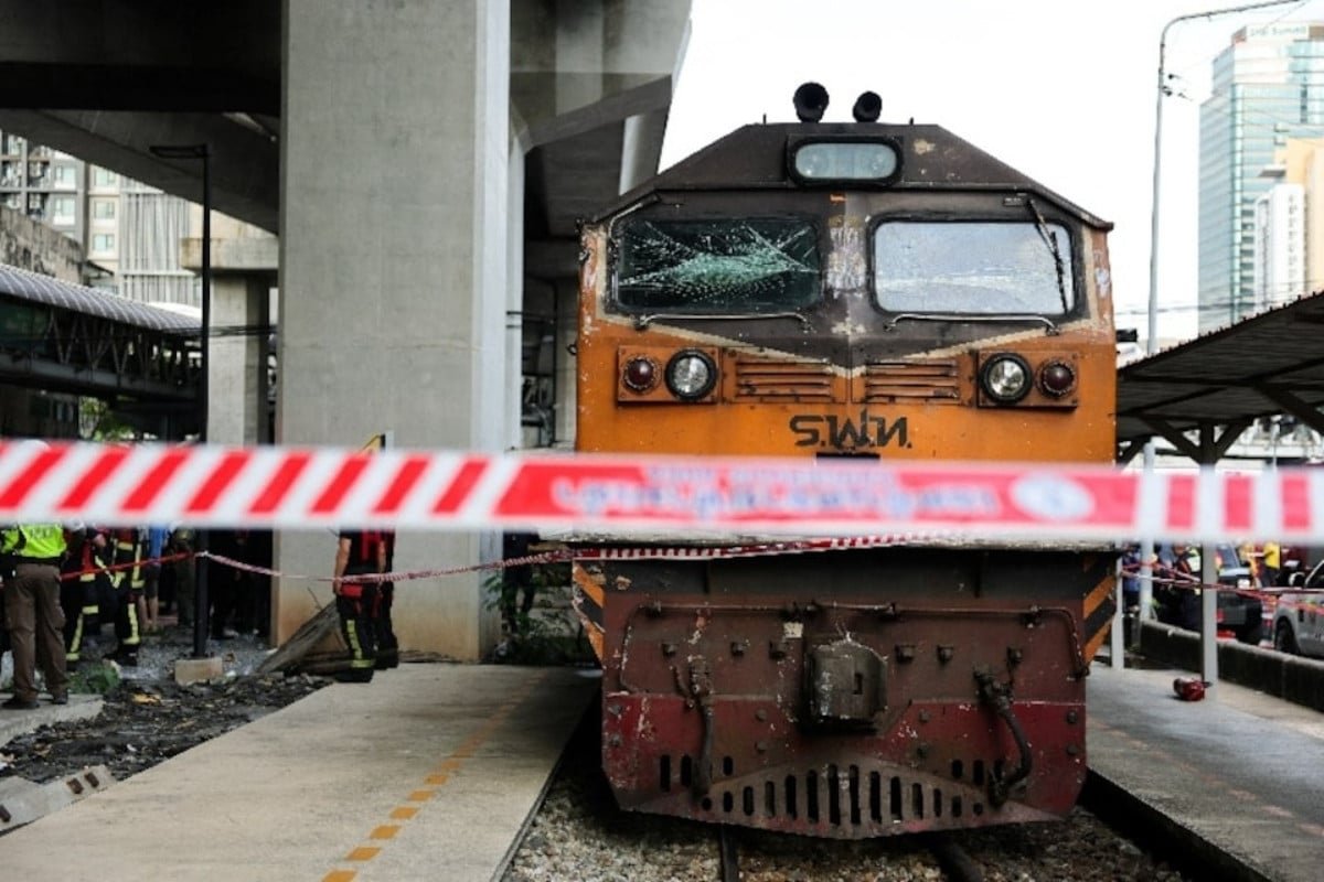 At least eight dead, 25 injured in train collision that sparks bus fire in Thailand