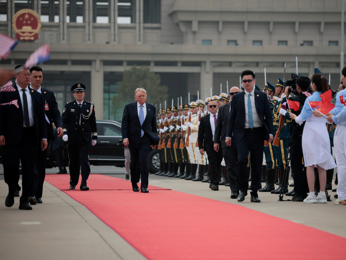 Trump leaves Beijing with few wins, many warm words for Xi